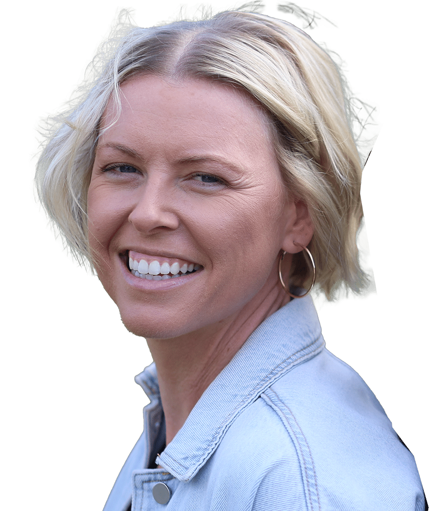 Adult smiling after braces treatment for crooked teeth.